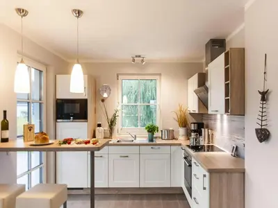 Küche/Küchenzeile in der Unterkunft Komfortables Ferienhaus mit Sauna in Fuhlendorf