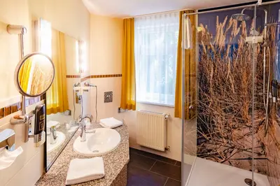 Ein Badezimmer in der Unterkunft Best Western Plus Ostseehotel Waldschloesschen