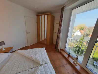 Ein Bett oder Betten in einem Zimmer der Unterkunft Klosterstr.14 Wohnung 12
