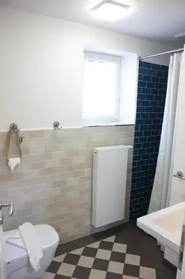 Ein Badezimmer in der Unterkunft Omi-Zingst - Haus Dora