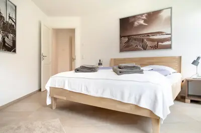 Ein Bett oder Betten in einem Zimmer der Unterkunft DÜNE-9 in Dierhagen-Strand