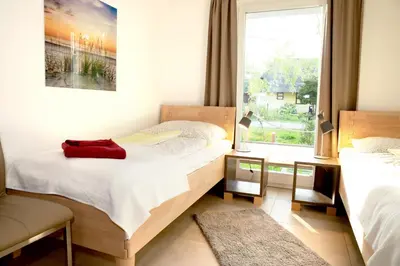 Ein Bett oder Betten in einem Zimmer der Unterkunft DÜNE-9 in Dierhagen-Strand