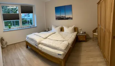 Ein Bett oder Betten in einem Zimmer der Unterkunft Fewo Barth