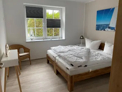 Ein Bett oder Betten in einem Zimmer der Unterkunft Fewo Barth
