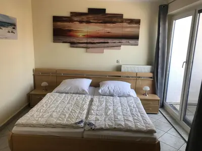 Ein Bett oder Betten in einem Zimmer der Unterkunft Klosterstr.14/Wohnung 7