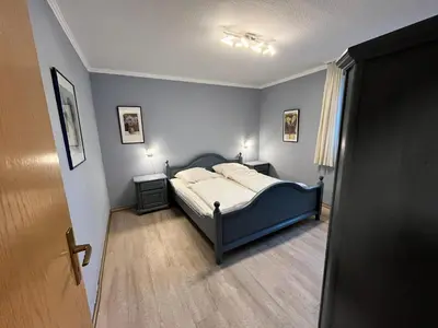 Ein Bett oder Betten in einem Zimmer der Unterkunft Lindenstr. 20 EG-Re Wg.4