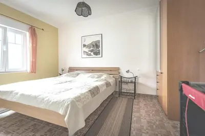 Ein Bett oder Betten in einem Zimmer der Unterkunft FeWo Möwe