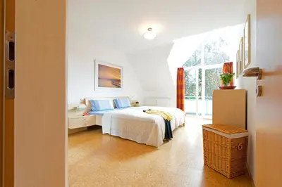 Ein Bett oder Betten in einem Zimmer der Unterkunft Lindenstr.43 /Wohng.5