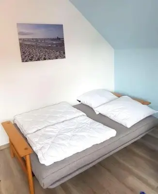 Ein Bett oder Betten in einem Zimmer der Unterkunft Lindenstrasse 13 Wohnung 4