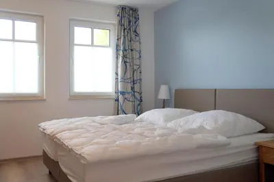 Ein Bett oder Betten in einem Zimmer der Unterkunft Lindenstrasse 13 Wohnung 4