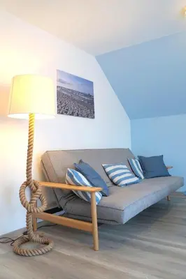Ein Sitzbereich in der Unterkunft Lindenstrasse 13 Wohnung 4