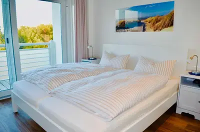 Ein Bett oder Betten in einem Zimmer der Unterkunft Buhne 10 App Nr 26 max 2 Pers