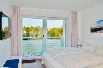 Ein Bett oder Betten in einem Zimmer der Unterkunft Buhne 10 App Nr 26 max 2 Pers