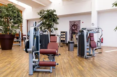 Das Fitnesscenter und/oder die Fitnesseinrichtungen in der Unterkunft Resort Hotel IV Jahreszeiten Zingst