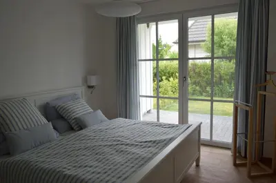 Ein Bett oder Betten in einem Zimmer der Unterkunft Müggenburger Weg 46 Wohnung Streifenfisch unten r