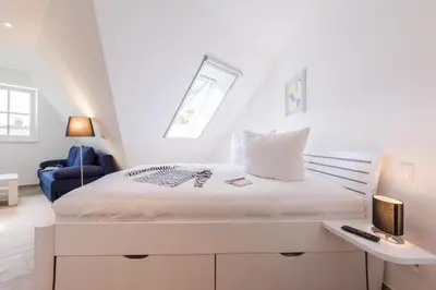 Ein Bett oder Betten in einem Zimmer der Unterkunft Müggenburger Weg Wohnung 2/5