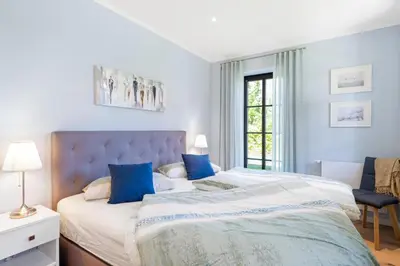 Ein Bett oder Betten in einem Zimmer der Unterkunft Zur Heiderose 3 Whg 3b MuschelSucher