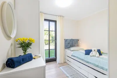 Ein Bett oder Betten in einem Zimmer der Unterkunft Zur Heiderose 3 Whg 3b MuschelSucher
