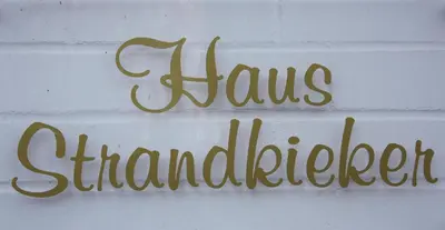 Ein Zertifikat, Auszeichnung, Logo oder anderes Dokument, das in der Unterkunft Rämel 38 Strandkieker Whg 15 ausgestellt ist