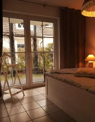 Ein Bett oder Betten in einem Zimmer der Unterkunft Rämel 38 Strandkieker Whg 15