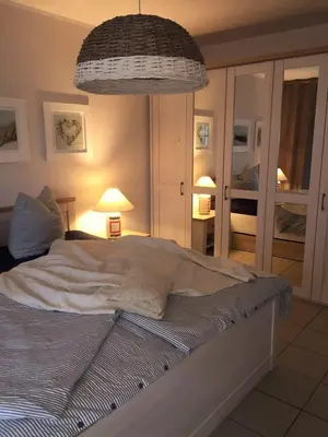 Ein Bett oder Betten in einem Zimmer der Unterkunft Rämel 38 Strandkieker Whg 15