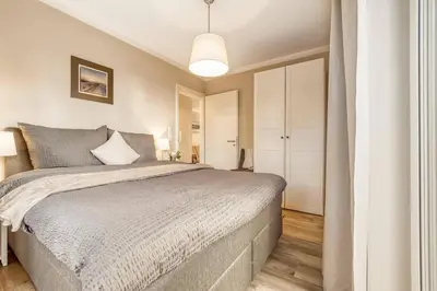 Ein Bett oder Betten in einem Zimmer der Unterkunft Rosenberg 41 a EG unten rechts