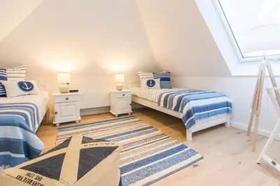 Ein Bett oder Betten in einem Zimmer der Unterkunft Schulstr. 15 