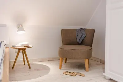 Ein Sitzbereich in der Unterkunft Schulstr. 15 