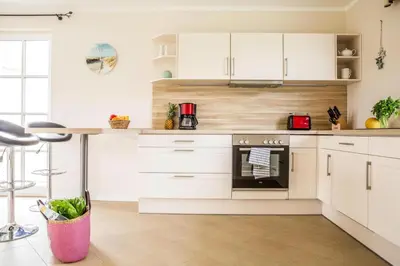 Küche/Küchenzeile in der Unterkunft Luxushaus Boddenküste mit Sauna