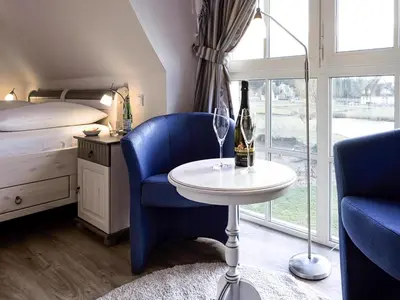 Ein Sitzbereich in der Unterkunft Luxushaus Boddenküste mit Sauna