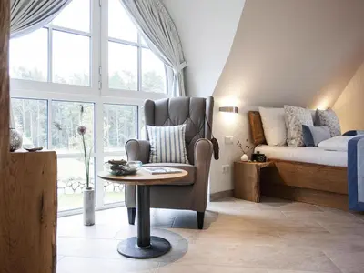 Ein Sitzbereich in der Unterkunft Ferienhaus, Fuhlendorf