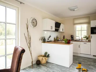 Küche/Küchenzeile in der Unterkunft Luxushaus Bodstedt mit Sauna am Bodden