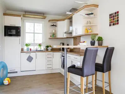 Küche/Küchenzeile in der Unterkunft Luxushaus Boddenküste mit Sauna