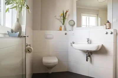Ein Badezimmer in der Unterkunft Luxushaus Boddenküste mit Lagune und Sauna