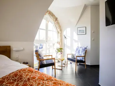 Ein Bett oder Betten in einem Zimmer der Unterkunft Luxushaus Boddenküste mit Sauna
