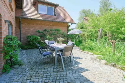 Ein Garten an der Unterkunft Dünenhof DÜNENHOF Whg. D-02