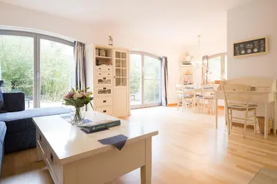 Ein Sitzbereich in der Unterkunft Dünenhof DÜNENHOF Whg. D-02