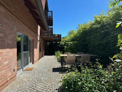 Ein Garten an der Unterkunft Dünenhof DÜNENHOF Whg. D-01