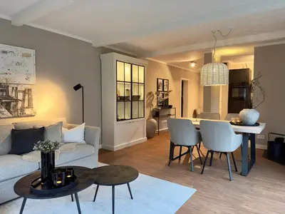 Ein Sitzbereich in der Unterkunft Dünenhof DÜNENHOF Whg. D-01