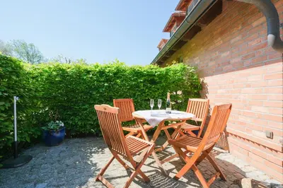Ein Patio oder anderer Außenbereich in der Unterkunft Dünenhof DÜNENHOF Whg. D-04