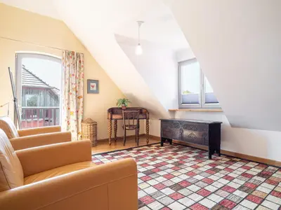 Ein Sitzbereich in der Unterkunft Dünenhof DÜNENHOF Whg. D-07
