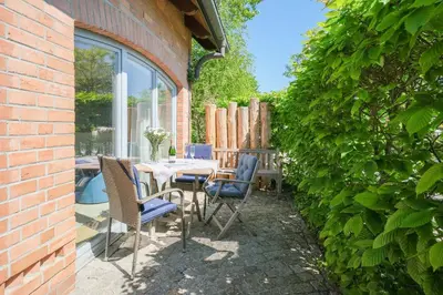 Ein Garten an der Unterkunft Dünenhof DÜNENHOF Whg. D-08