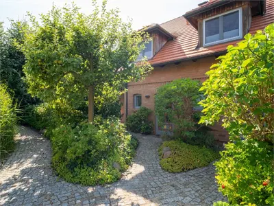 Ein Garten an der Unterkunft Dünenhof DÜNENHOF Whg. D-09