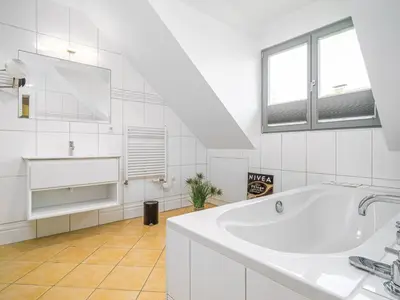 Ein Badezimmer in der Unterkunft Dünenhof DÜNENHOF Whg. D-09
