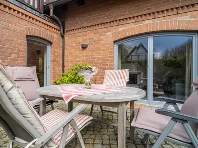 Ein Patio oder anderer Außenbereich in der Unterkunft Dünenhof DÜNENHOF Whg. D-11