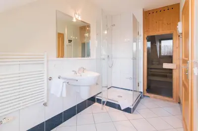 Ein Badezimmer in der Unterkunft Dünenhof DÜNENHOF Whg. D-12
