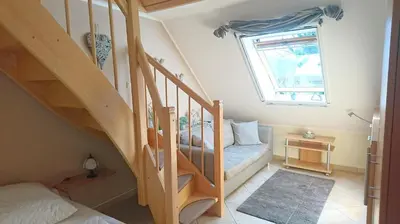 Ein Bett oder Betten in einem Zimmer der Unterkunft Schulstrasse 10a App.