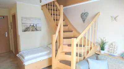 Ein Bett oder Betten in einem Zimmer der Unterkunft Schulstrasse 10a App.