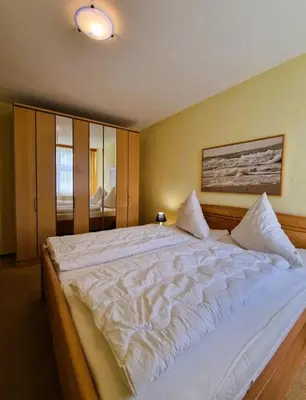 Ein Bett oder Betten in einem Zimmer der Unterkunft Strandstr.41 Fewo 1