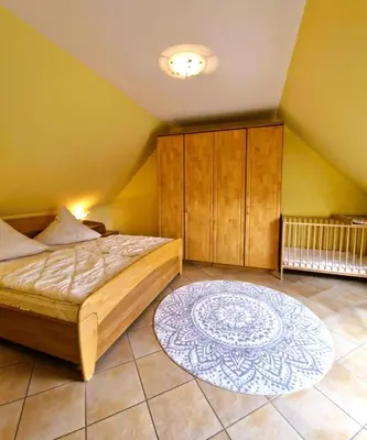 Ein Bett oder Betten in einem Zimmer der Unterkunft Strandstr.41 Fewo 1